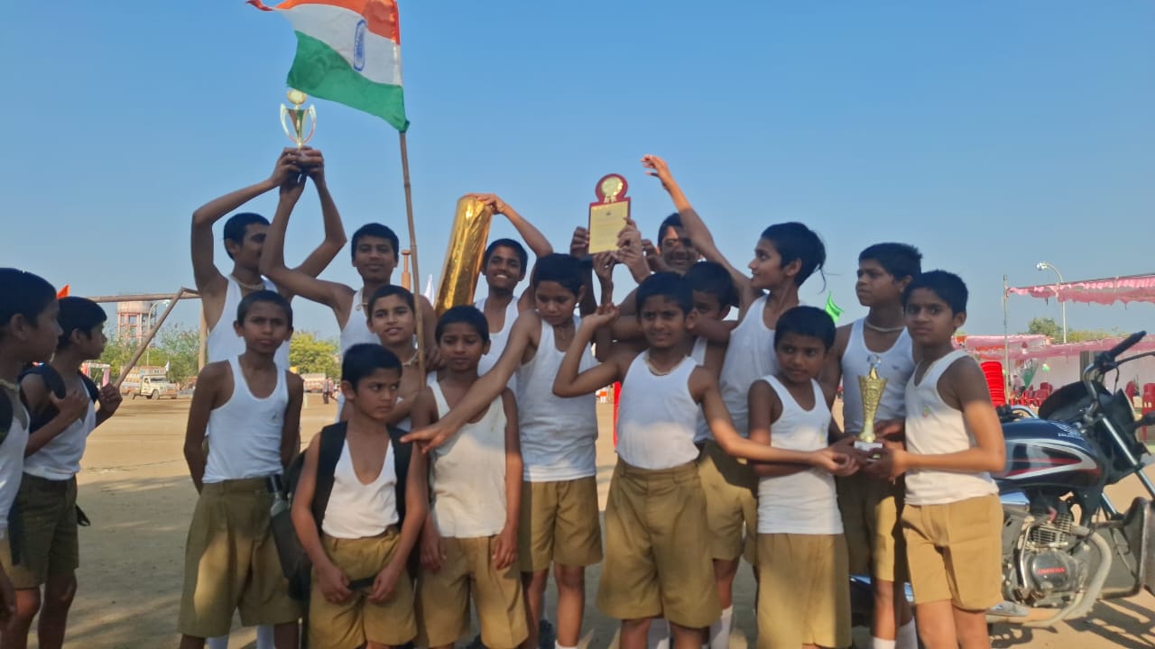 Students with Trophies and Indian Flag